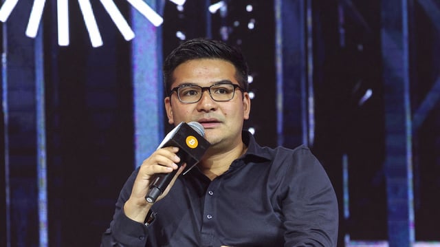 Asher Genoot, CEO of Hut 8, which owns 98% of American Bitcoin, along with Eric Trump and Donald Trump Jr., speaks at a bitcoin conference in Hong Kong on August 28.