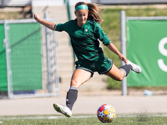 University of Saskatchewan Huskies' Tia Lecox puts foot to ball during a women's soccer game against Alberta.