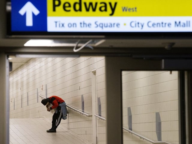 A woman under the influence of fentanyl or carfentanil in Edmonton's underground pedway system on Feb. 25, 2022. 
