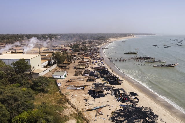 Artisanal fishermen on the shore of Gunjur, Gambia, on March 23, 2025. (AP Photo/Grace Ekpu)