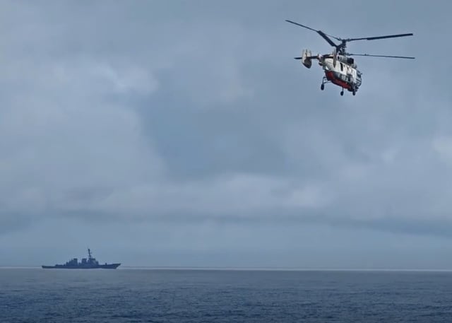 Footage released by Russia's Pacific Fleet on August 25, 2025, appears to capture a United States Navy destroyer monitoring a Russian and Chinese joint naval patrol in the central Pacific Ocean on an unspecified date in August.