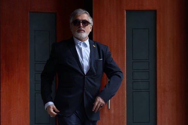 Iranian ambassador to Australia Ahmad Sadeghi stands outside his residence, after being expelled on Tuesday and given seven days to leave the country by Prime Minister Anthony Albanese, who accused Iran of orchestrating at least two antisemitic attacks on Australian soil, in Canberra, Australia, August 28, 2025. REUTERS/Hollie Adams