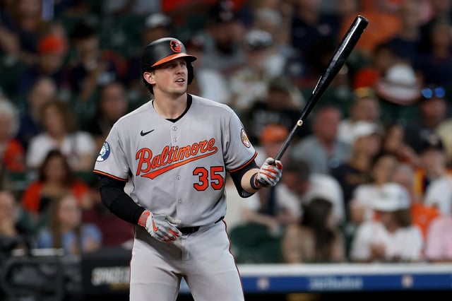 HOUSTON, TEXAS - AUGUST 17: Adley Rutschman #35 of the Baltimore Orioles bats in the fifth inning against the Houston Astros at Daikin Park on August 17, 2025 in Houston, Texas.