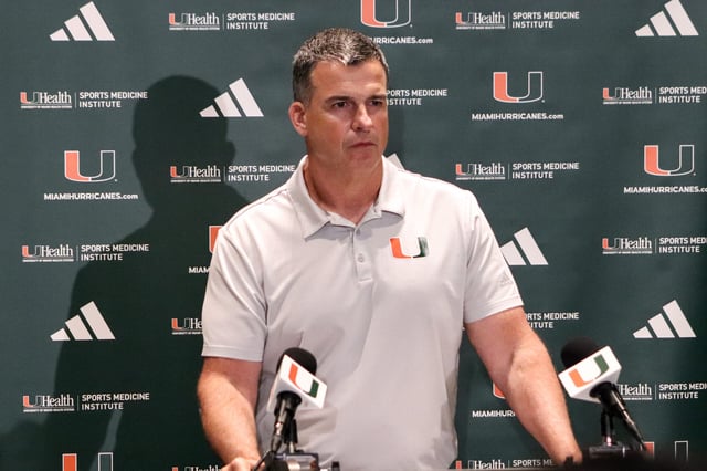 Makena Wong, Photo Editor, Head Football Coach Mario Cristobal answers questions during a press conference ahead of the University of Miami vs. Notre Dame football game on Monday, Aug. 25, 2025.