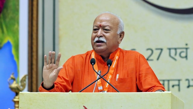 RSS chief Mohan Bhagwat addresses the gathering during an event to mark 100 years of Rashtriya Swayamsevak Sangh at Bharat Mandapam, in New Delhi.