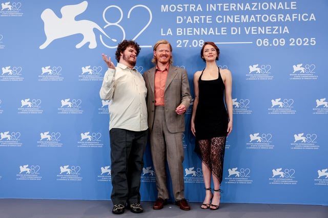 Cast members Aidan Delbis, Jesse Plemons and Emma Stone pose during a photocall for the movie "Bugonia" in competition, at the 82nd Venice Film Festival, in Venice, Italy, August 28, 2025. REUTERS/Remo Casilli