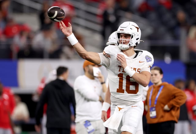 ARLINGTON, TEXAS - JANUARY 10: Arch Manning #16 of the Texas Longhorns warms up before the Goodyear Cotton Bowl against the Ohio State Buckeyes at AT&T Stadium on January 10, 2025 in Arlington, Texas. (Photo by Sam Hodde/Getty Images)