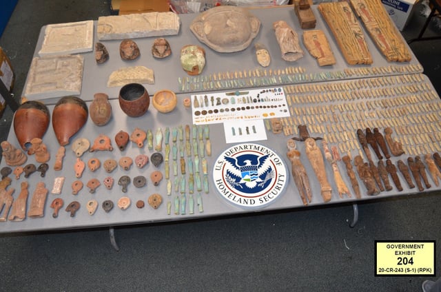 Many of the Egyptian artifacts found in the luggage of Ashraf Omar Eldarir while entering JFK Airport on Jan. 22, 2020. (U.S. Department of Justice)