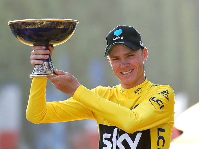 FILE PHOTO: Cycling - Tour de France cycling race - The 113-km (70,4 miles) Stage 21 from Chantilly to Paris, France - 24/07/2016  - Yellow jersey leader and overall winner Team Sky rider Chris Froome of Britain reacts on the podium.       REUTERS/Juan Medina TPX IMAGES OF THE DAY/File Photo