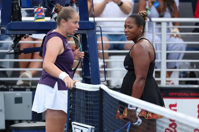 Taylor Townsend (right) greets Jelena Ostapenko of Latvia during their Women's Singles Second Round match on Day Four of the 2025 US Open at USTA Billie Jean King National Tennis Center on August 27, 2025 in the Flushing neighborhood of the Queens borough of New York City. (Photo by Clive Brunskill/Getty Images)