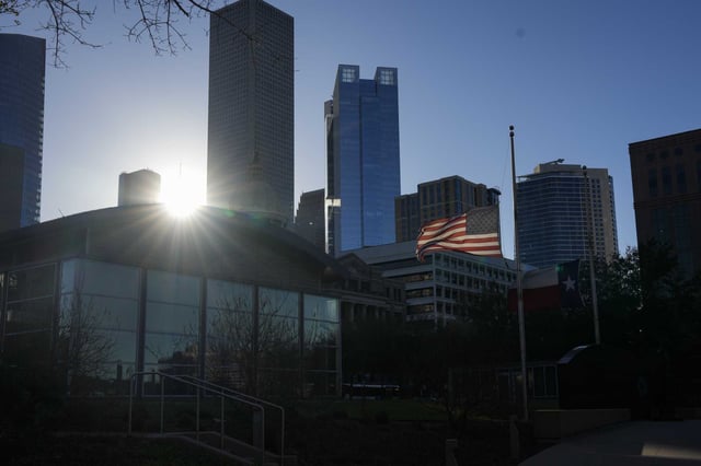 A photo from March shows flags flying at half-staff after the passing of former Mayor and U.S. Rep. Sylvester Turner at El Franco Lee Service Plaza in Houston, Wednesday, March 5, 2025.