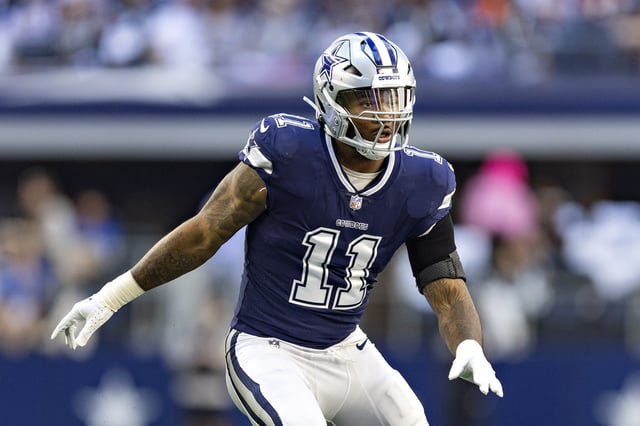 Micah Parson #11 of the Dallas Cowboy at the line of scrimmage during a game against the Chicago Bears at AT&T Stadium on October 30, 2022 in Arlington, Texas.