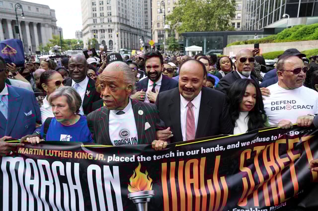 Civil rights leader Rev. Al Sharpton, New York City mayoral candidate Zohran Mamdani and Martin Luther King III take part in the National Action Network (NAN) March on Wall Street in New York City, U.S., August 28, 2025. REUTERS/Christian Monterrosa