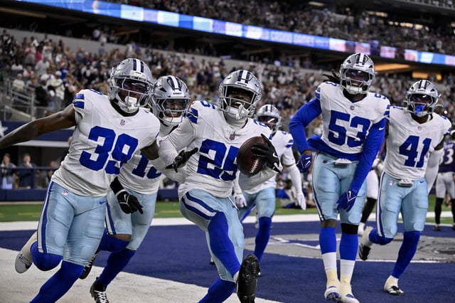 Aug 16, 2025; Arlington, Texas, USA; Dallas Cowboys cornerback Andrew Booth (25) and safety Mike Smith Jr. (39) and linebacker James Houston (53) celebrate after Booth returns a interception for touchdown against the Dallas Cowboys during the first quarter at AT&T Stadium. Mandatory Credit: Jerome Miron-Imagn Images/File Photo