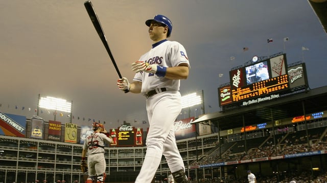 Texas Rangers first baseman Mark Teixeira walks to the plate against the Boston Red Sox during an American League game in Arlington, Texas on July 30, 2003. Photo: Brian Bahr/Getty Images