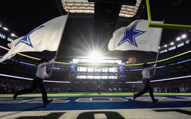 Oct 13, 2024; Arlington, Texas, USA;  A general view of the field as flag runners run by after a Dallas Cowboys score against the Detroit Lions at AT&T Stadium. Mandatory Credit: Kevin Jairaj-Imagn Images/File Photo