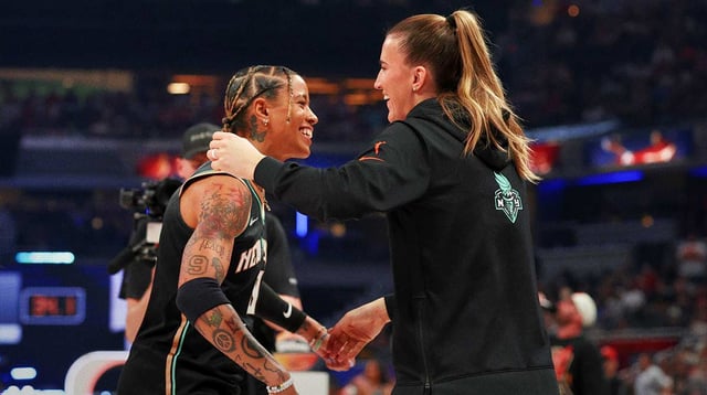 Jul 18, 2025; Indianapolis, IN, USA; New York Liberty guard Natasha Cloud is congratulated by teammate Sabrina Ionescu during the 2025 WNBA All Star Skills Challenge at Gainbridge Fieldhouse. Mandatory Credit: Trevor Ruszkowski-Imagn Images.