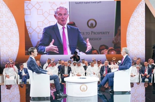 Former Prime Minister Tony Blair (R) and  Jared Kushner (L), U.S. President Donald Trumps  son-in-law  in Manama, Bahrain on June 26, 2019.     (Photo by BNA - Pool/Anadolu Agency/Getty Images)