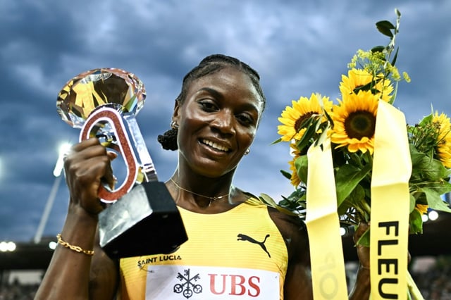 Saint Lucia's Julien Alfred celebrates winning the 100m at the Zurich Diamond League finals