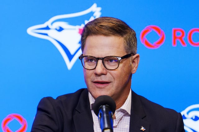 TORONTO, ON - APRIL 14: Ross Atkins, general manager of the Toronto Blue Jays, speaks during a press conference before Vladimir Guerrero Jr. signs a 14-year contract extension at Rogers Centre on April 14, 2025 in Toronto, Ontario, Canada. (Photo by Mark Blinch/Getty Images)