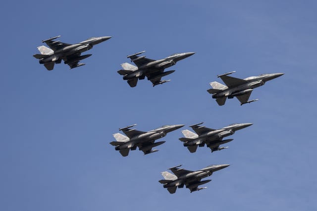 Polish Air Force F-16 fighters take part in a military parade in Warsaw on Polish Army Day, August 15, 2024, to commemorate the anniversary of the 1920 victory over Soviet Russia at the Battle of Warsaw during the PolishSoviet War.