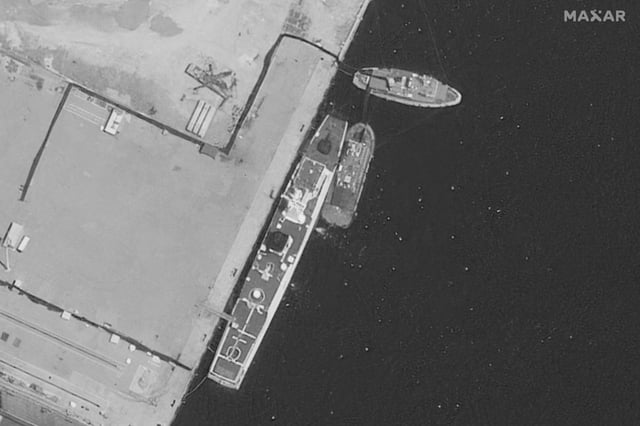 A satellite photo captured by Maxar Technologies on August 21, 2025, shows a damaged China coast guard vessel alongside a dry dock at Yulin naval base in China's southern Hainan province.