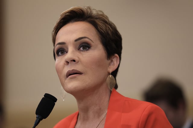 A federal judge barred Kari Lake, above, from ousting the Voice of America's Director.