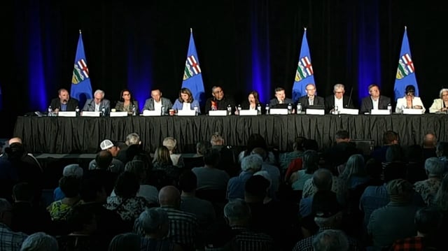 Premier Danielle Smith's Alberta Next panel heard loud cheers for mass deportation of immigrants and Alberta separation during an otherwise tame town hall in Lloydminster on Wednesday evening.