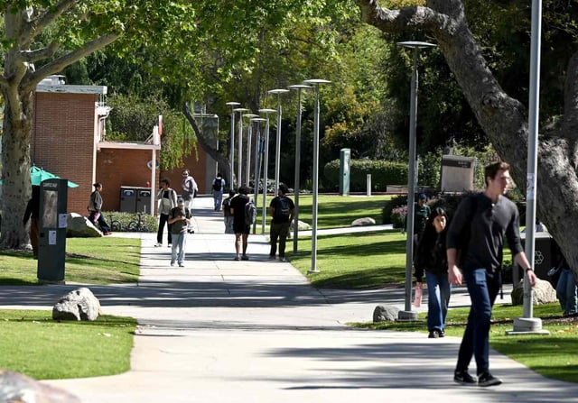 Cal Poly Pomona students walk across campus Wednesday, March 19, 2025. (Photo by Will Lester, Inland Valley Daily Bulletin/SCNG)