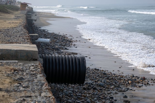 Sewage and drain pipes are seen at Playas de Tijuana, Baja California state, Mexico, on March 21, 2024.