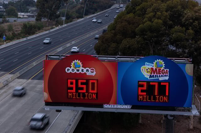 A drone captures a Powerball billboard towering over a San Diego freeway, advertising a jackpot nearing $1 billion, in San Diego, California, U.S., August 28, 2025.