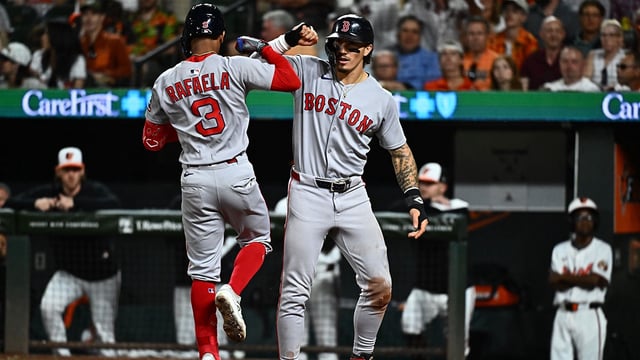 Aug 27, 2025; Baltimore, Maryland, USA; Boston Red Sox outfielder Ceddanne Rafaela (3) celebrates with outfielder Jarren Duran (16) after hitting a two run home run during the ninth inning against the Baltimore Orioles at Oriole Park at Camden Yards. Mandatory Credit: James A. Pittman-Imagn Images