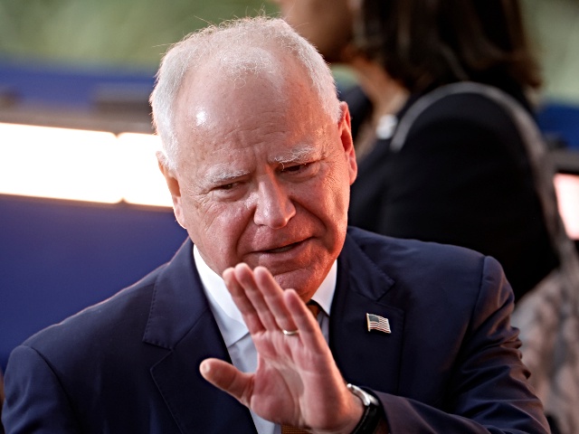 Democratic vice presidential nominee, Minnesota Gov. Tim Walz reacts as Democratic presidential nominee, U.S. Vice President Kamala Harris concedes the election during a speech at Howard University on November 06, 2024 in Washington, DC. After a contentious campaign focused on key battleground states, the Republican presidential nominee, former U.S. President Donald Trump was projected to secure the majority of electoral votes, giving him a second term as U.S. President. Republicans also secured control of the Senate for the first time in four years. Kevin Dietsch/Getty