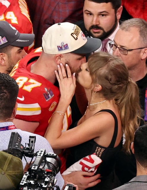 Kansas City Chiefs' Travis Kelce kisses partner Taylor Swift as they celebrate after the Chiefs won Super Bowl LVIII on Feb 11, 2024 in Las Vegas, Nevada.