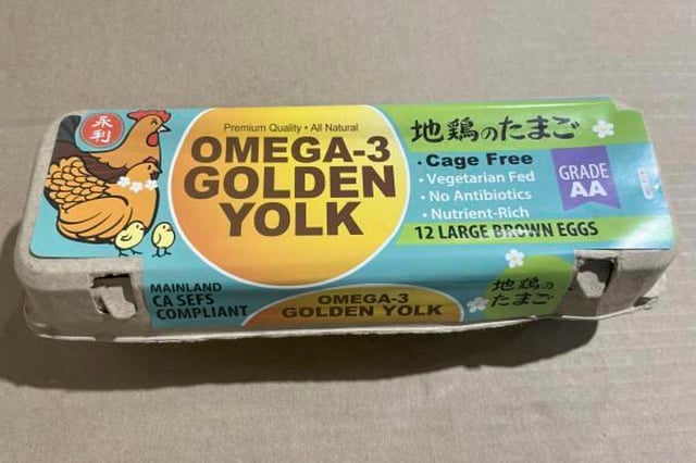 This undated photo released by the U.S. Food and Drug Administration shows a carton of large brown cage free “sunshine/omega-3 golden” yolk eggs sourced from Country Eggs. A Salmonella outbreak tied to recalled eggs has sickened 95 people in 14 states, including 73 in California, officials say.