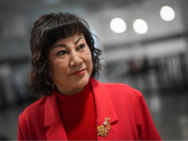 Billionaire Ruby Liu listens during an interview at a former Hudson's Bay-owned Saks Off 5th department store after a "handover ceremony" where she received the keys to the space at Tsawwassen Mills shopping mall that she owns in Tsawwassen on June 26, 2025