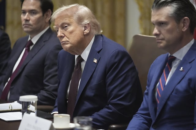 President Donald Trump, Secretary of State Marco Rubio, left, and Secretary of Defense Pete Hegseth, right, listen during a cabinet meeting. Tuesday, Aug. 26, 2025, at the White House in Washington. (AP Photo/Mark Schiefelbein)
