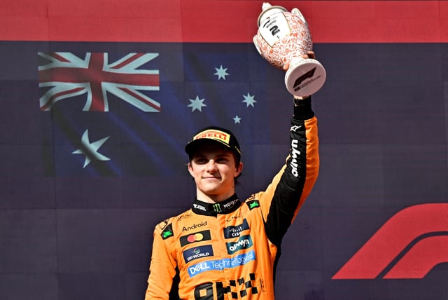 Formula One F1 - Hungarian Grand Prix - Hungaroring, Budapest, Hungary - August 3, 2025 McLaren's Oscar Piastri celebrates on the podium with a trophy after finishing second place in the Hungarian Grand Prix REUTERS/Marton Monus/File Photo