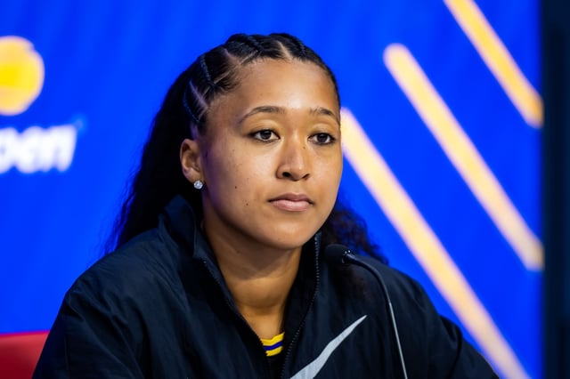 Naomi Osaka talking to the media after defeating Hailey Baptiste in the US Open second round.