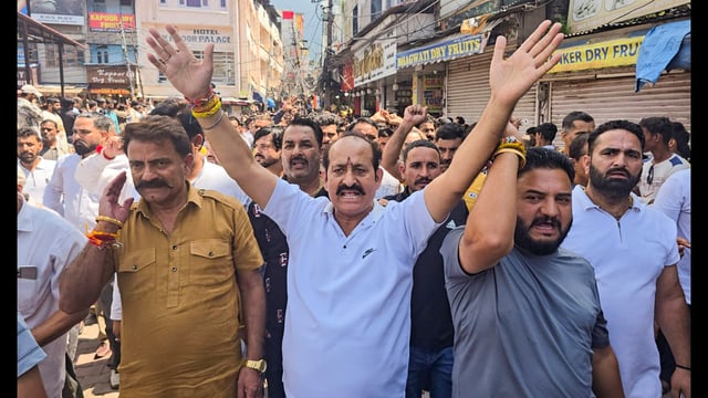 People hold a protest against the Shri Mata Vaishno Devi Shrine Board following the death of pilgrims due to landslide and heavy rainfall, at Katra, in Reasi, on Thursday. (PTI)