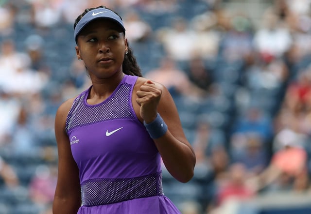Tennis - U.S. Open - Flushing Meadows, New York, United States - August 28, 2025 Japan's Naomi Osaka reacts during her second round match against Hailey Baptiste of the U.S. REUTERS/Mike Segar