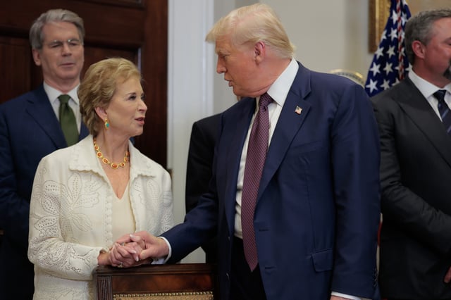 U.S. President Donald Trump speaks with Secretary of Education Linda McMahon during an executive order signing ceremony in the Roosevelt Room of the White House on July 31, 2025, in Washington, DC.