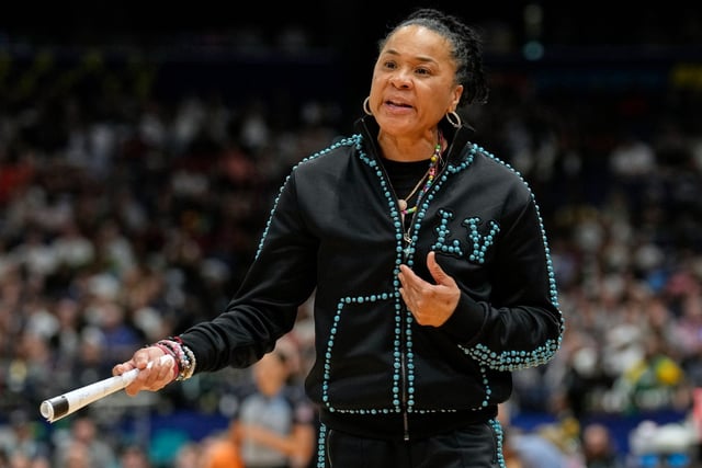 FILE - South Carolina head coach Dawn Staley reacts during the first half of the national championship game against UConn at the Final Four of the women's NCAA college basketball tournament, April 6, 2025, in Tampa, Fla. (AP Photo/Chris O'Meara, File)