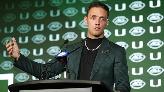 Miami quarterback Carson Beck answers questions from the media during ACC Media Days at Hilton Charlotte Uptown. Mandatory Credit: Jim Dedmon-Imagn Images