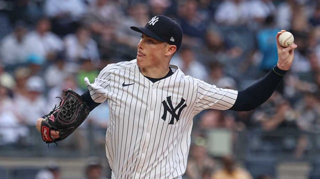 Jun 18, 2025; Bronx, New York, USA; New York Yankees relief pitcher Ryan Yarbrough (33) delivers a pitch during the first inning against the Los Angeles Angels at Yankee Stadium. Mandatory Credit: Vincent Carchietta-Imagn Images.