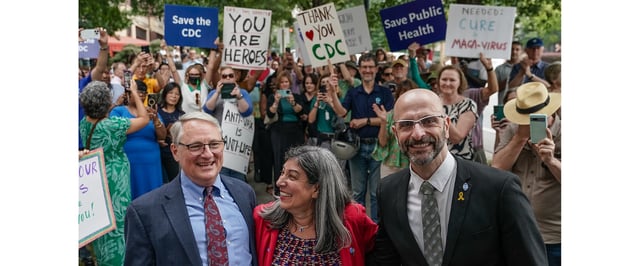 Former Centers for Disease Control officials Dan Jernigan, Deb Houry and Demetre Daskalakis smile as employees and supporters of the CDC line up outside its global headquarters on August 28 in Atlanta. The three officials were honored after resigning in the wake of U.S. President Donald Trump's attempted firing of CDC director Susan Monarez. (Photo by Elijah Nouvelage/Getty Images)