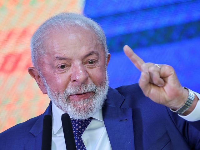 Brazil's President Luiz Inacio Lula da Silva speaks during a ceremony of signing a provisional measure establishing an initial set of actions to mitigate the economic impact due to U.S. President Donald Trump's decision to raise import tariffs on Brazilian products by up to 50%, at the Planalto Palace, in Brasilia, Brazil, August 13, 2025. REUTERS/Adriano Machado