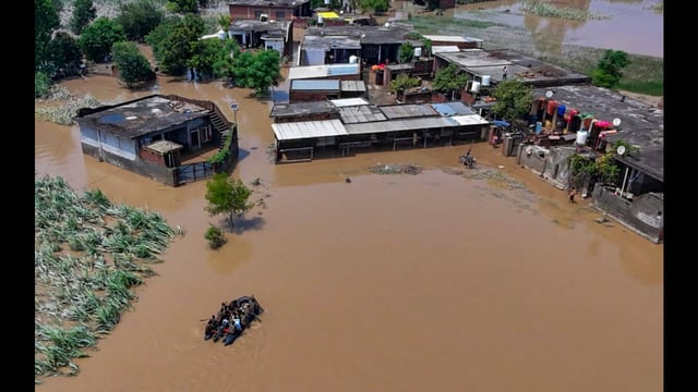 Partially submerged houses at a flood-ravaged area in Gurdaspur . (PTI)