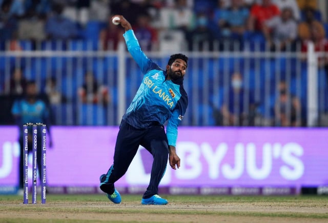 Cricket - ICC Men's T20 World Cup - Super 12 - Group 1 - England v Sri Lanka - Sharjah Cricket Stadium, Sharjah, United Arab Emirates - November 1, 2021 Sri Lanka's Wanindu Hasaranga de Silva in action REUTERS/Hamad I Mohammed/File Photo