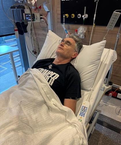 Dave Hughes in his hospital bed after the Legends Game.